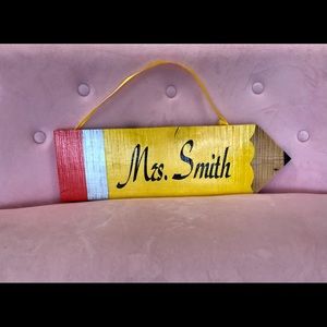 Teacher pencil sign
